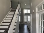 Stairs Leading Up From Family Room to 3 Bedrooms and Loft Upstairs